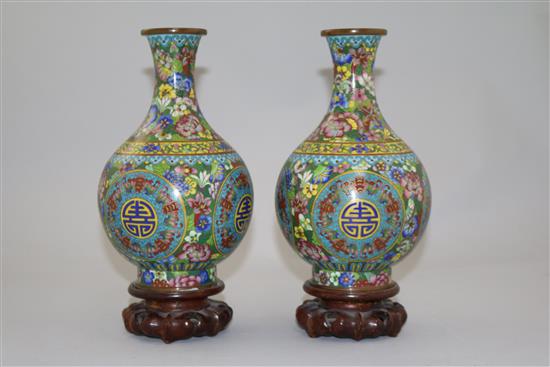 A pair of Chinese cloisonne enamel millefleur baluster vases, early 20th century, total height 22cm